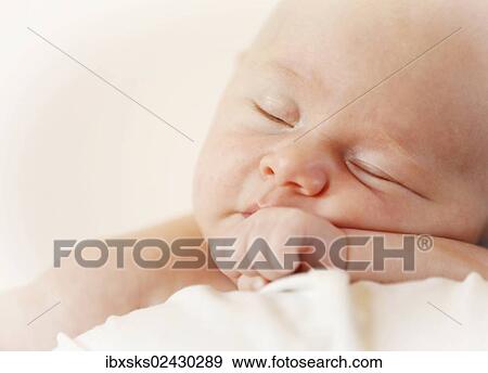 "Baby girl, 3 months, being held by her mother, sleeping, portrait" View Large Photo Image Stock Photo - "Baby girl, 3 months, being held by her mother, sleeping, portrait". Fotosearch