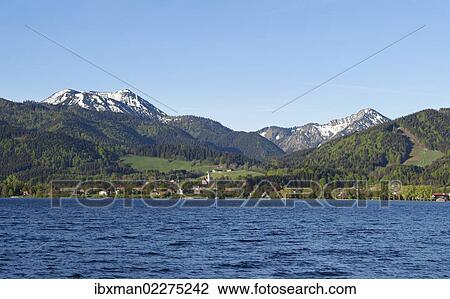 "Bad Wiessee with Hirschberg mountain and Fockenstein mountain, lake Tegernsee, Tegernsee valley, Mangfall Mountains, Upper Bavaria, Bavaria, Germany, Europe" View Large Photo Image Stock Image - "Bad Wiessee with Hirschberg mountain and Fockenstein mountain, lake Tegernsee, Tegernsee valley, Mangfall Mountains, Upper Bavaria, Bavaria, Germany, Europe". Fotosearch