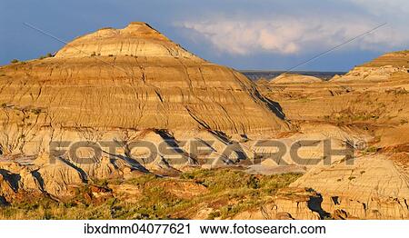 "Badlands in the evening light, eroded rock formations of sedimentary rock, Dinosaur Provincial Park, UNESCO World Heritage Site, Alberta Province, Canada, North America" View Large Photo Image Stock Image - "Badlands in the evening light, eroded rock formations of sedimentary rock, Dinosaur Provincial Park, UNESCO World Heritage Site, Alberta Province, Canada, North America". Fotosearch