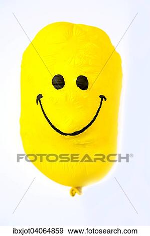 "Balloon, yellow, with friendly smiley face, shrunk" View Large Photo Image Stock Photo - "Balloon, yellow, with friendly smiley face, shrunk". Fotosearch