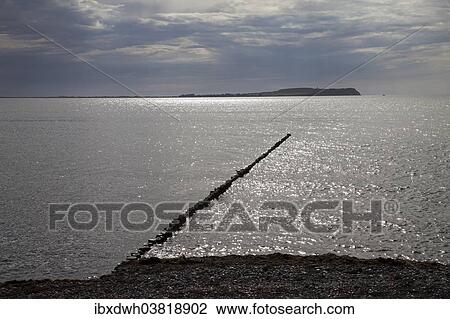 "Baltic Sea coast with backlighting, Hiddensee Island at the rear, Dranske, Rugen Island, Mecklenburg-Vorpommern, Germany, Europe" View Large Photo Image Stock Image - "Baltic Sea coast with backlighting, Hiddensee Island at the rear, Dranske, Rugen Island, Mecklenburg-Vorpommern, Germany, Europe". Fotosearch