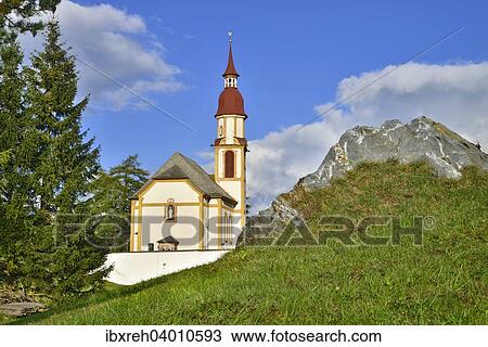Stock Image - "Baroque parish church of St. Nicholas, Obernberg am Brenner, Tyrol, Austria, Europe". Fotosearch