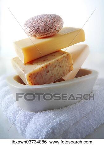 Bars of hand-made soaps piled in a soap dish View Large Photo Image Stock Photograph - Bars of hand-made soaps piled in a soap dish. Fotosearch