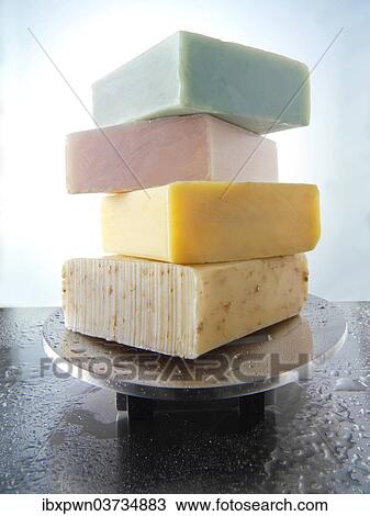 Bars of hand-made soaps piled on a soap dish View Large Photo Image Stock Image - Bars of hand-made soaps piled on a soap dish. Fotosearch