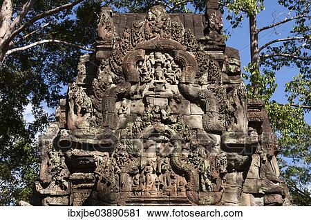 Stock Image - "Bas-relief on an entrance gate, Angkor Thom, Siem Reap, Cambodia, Asia". Fotosearch