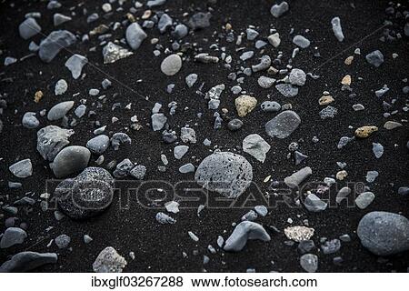 "Basalt stones in black lava sand, Skeioararsandur, Southern Region, Iceland, Europe" View Large Photo Image Stock Photo - "Basalt stones in black lava sand, Skeioararsandur, Southern Region, Iceland, Europe". Fotosearch