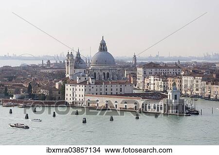 Picture - "Basilica di Santa Maria della Salute and the Grand Canal, mainland at the far back, Venice, Veneto, Italy, Europe". Fotosearch