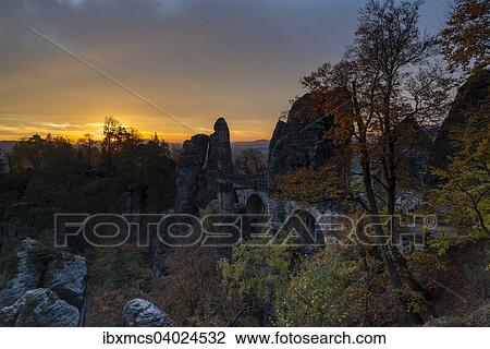 "Basteibrucke in the morning light, Saxon Switzerland National Park, Lohmen, Saxony, Germany, Europe" View Large Photo Image Stock Image - "Basteibrucke in the morning light, Saxon Switzerland National Park, Lohmen, Saxony, Germany, Europe". Fotosearch