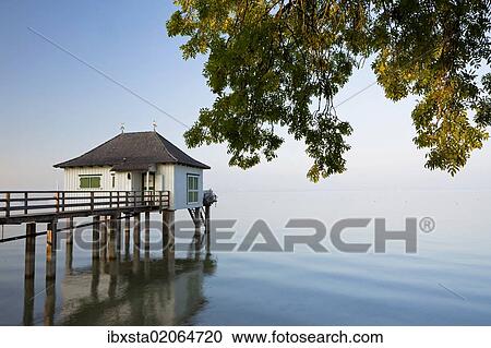 "Bath house in the last evening light with gentle autumn fog near Kesswil on Lake Constance, Switzerland, Europe, PublicGround, Europe" View Large Photo Image Stock Image - "Bath house in the last evening light with gentle autumn fog near Kesswil on Lake Constance, Switzerland, Europe, PublicGround, Europe". Fotosearch