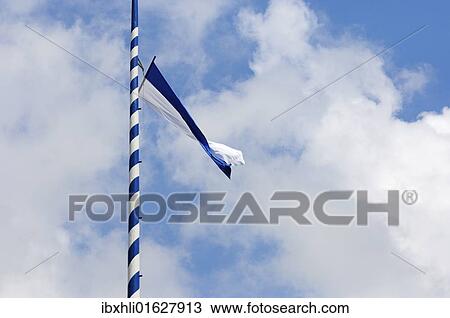 "Bavarian flag flying on a Maypole, Bavaria, Germany, Europe" View Large Photo Image Stock Image - "Bavarian flag flying on a Maypole, Bavaria, Germany, Europe". Fotosearch