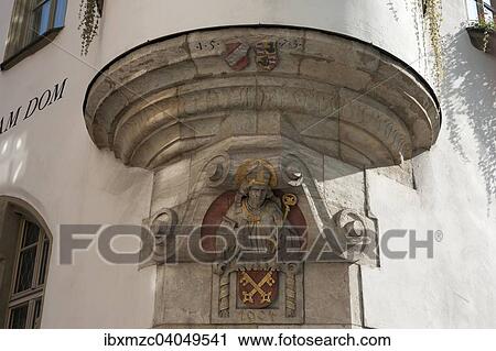 Stock Image - "Bay, 1573, relief with bishop with the coat of arms of Regensburg, now a hotel, former Bishop's residence Bischofshof, Regensburg, Upper Palatinate, Bavaria, Germany, Europe". Fotosearch