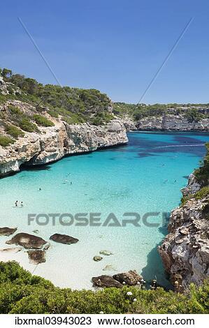 "Bay and beach of Cala d'es Moro in Cala S'Almonia, Santanyi, Majorca, Balearic Islands, Spain, Europe" View Large Photo Image Stock Image - "Bay and beach of Cala d'es Moro in Cala S'Almonia, Santanyi, Majorca, Balearic Islands, Spain, Europe". Fotosearch