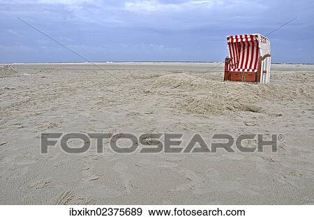Stock Photo - "Beach chair, Amrum island, North Sea beach, Schleswig-Holstein, Germany, Europe". Fotosearch