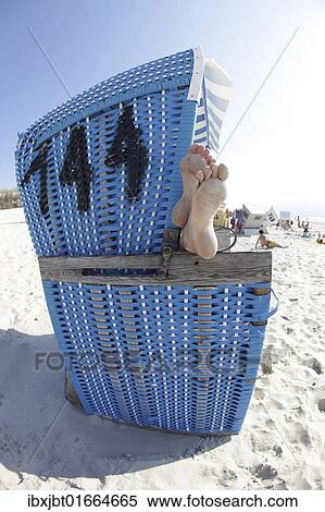 "Beach chair, feet, beach, Langeoog island, East Frisian Islands, North Sea, Germany, Europe" View Large Photo Image Stock Photography - "Beach chair, feet, beach, Langeoog island, East Frisian Islands, North Sea, Germany, Europe". Fotosearch