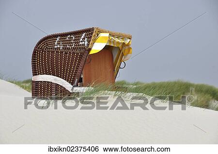 "Beach chair in the dunes, Amrum island, North Sea, Schleswig-Holstein, Germany, Europe" View Large Photo Image Stock Photograph - "Beach chair in the dunes, Amrum island, North Sea, Schleswig-Holstein, Germany, Europe". Fotosearch