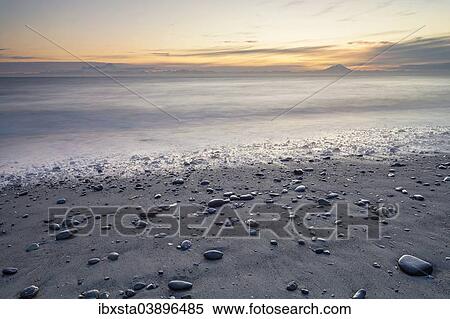 "Beach of Kenai, Mt Redoubt volcano at the back, Kenai, Alaska, United States, North America" View Large Photo Image Stock Photography - "Beach of Kenai, Mt Redoubt volcano at the back, Kenai, Alaska, United States, North America". Fotosearch