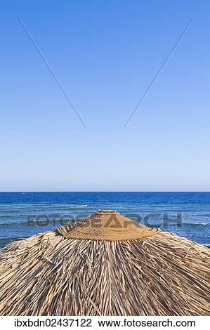 "Beach parasol with sea view, Dahab, Egypt, Africa" View Large Photo Image Stock Image - "Beach parasol with sea view, Dahab, Egypt, Africa". Fotosearch