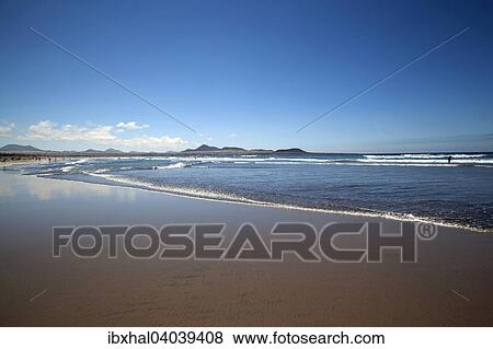 Stock Photo - "Beach Playa de Famara, Lanzarote, Canary Islands, Spain, Europe". Fotosearch