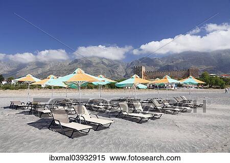 "Beach with sun beds, the Venetian castle at the back, Frangokastello, Crete, Greece, Europe" View Large Photo Image Stock Photography - "Beach with sun beds, the Venetian castle at the back, Frangokastello, Crete, Greece, Europe". Fotosearch
