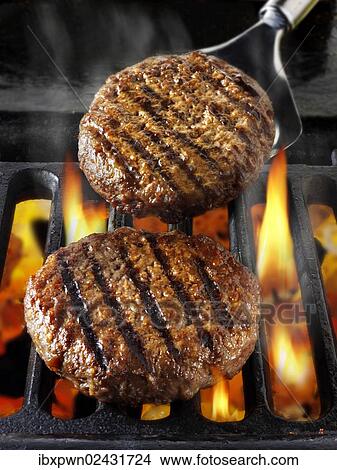 "Beef burgers, hamburgers, on barbecue" View Large Photo Image Picture - "Beef burgers, hamburgers, on barbecue". Fotosearch