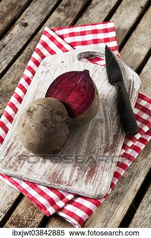 Stock Photography - "Beetroot, sliced â€‹â€‹on a wooden board". Fotosearch