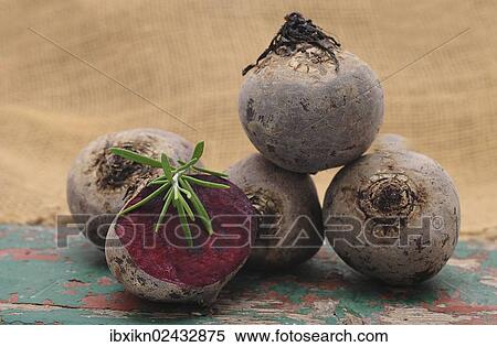Beetroot stacked on an old wooden board View Large Photo Image Stock Photography - Beetroot stacked on an old wooden board. Fotosearch