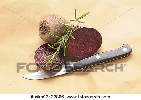 Beetroot with a knife View Large Photo Image Stock Photograph - Beetroot with a knife. Fotosearch