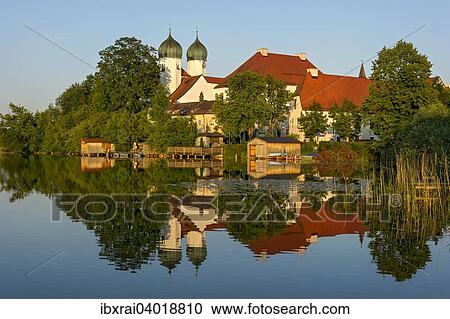 "Benedictine Kloster Seeon monastery with monastery church of St. Lambert, Klostersee, Seebruck, Chiemgau, Upper Bavaria, Bavaria, Germany, Europe" View Large Photo Image Stock Image - "Benedictine Kloster Seeon monastery with monastery church of St. Lambert, Klostersee, Seebruck, Chiemgau, Upper Bavaria, Bavaria, Germany, Europe". Fotosearch