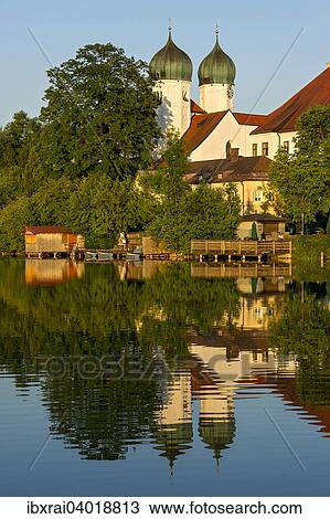"Benedictine Kloster Seeon monastery with monastery church of St. Lambert, Klostersee, Seebruck, Chiemgau, Upper Bavaria, Bavaria, Germany, Europe" View Large Photo Image Stock Image - "Benedictine Kloster Seeon monastery with monastery church of St. Lambert, Klostersee, Seebruck, Chiemgau, Upper Bavaria, Bavaria, Germany, Europe". Fotosearch