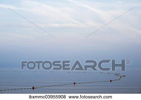 "Blocked off non-swimmers area in the sea, in Umag, Monterol, Istria, Croatia, Europe" View Large Photo Image Stock Photo - "Blocked off non-swimmers area in the sea, in Umag, Monterol, Istria, Croatia, Europe". Fotosearch