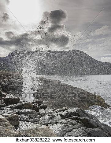 "Blowhole on the coast, island of Senja, Troms, Norway, Europe" View Large Photo Image Stock Image - "Blowhole on the coast, island of Senja, Troms, Norway, Europe". Fotosearch