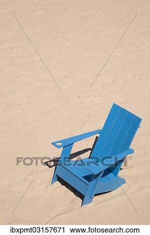 "Blue adirondack chair standing on a beach, Old Port of Montreal, Quebec Province, Canada, North America" View Large Photo Image Stock Image - "Blue adirondack chair standing on a beach, Old Port of Montreal, Quebec Province, Canada, North America". Fotosearch