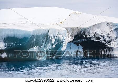 "Blue and black iceberg off Laurie Island, Washington Strait, South Orkneys, Southern Ocean, Antarctica" View Large Photo Image Stock Image - "Blue and black iceberg off Laurie Island, Washington Strait, South Orkneys, Southern Ocean, Antarctica". Fotosearch