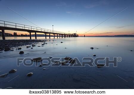 Stock Photography - "Blue hour at the ship pier of Mannenbach, Lake Constance, Canton of Thurgau, Switzerland, Europe". Fotosearch