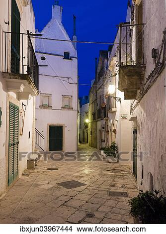 "Blue hour, dusk, alleyway, Locorotondo, Apulia, Italy, Europe" View Large Photo Image Picture - "Blue hour, dusk, alleyway, Locorotondo, Apulia, Italy, Europe". Fotosearch