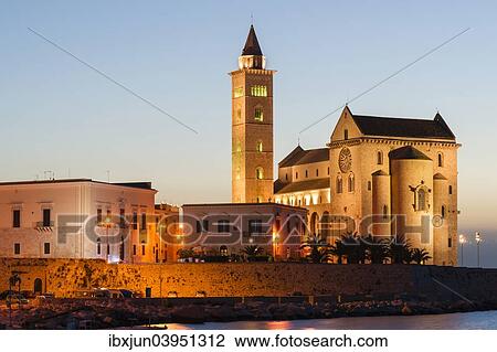 Stock Image - "Blue hour, Gothic Norman Church, Marine Cathedral, Cathedral of San Nicola Pellegrino, 11th century, Trani, Bari province, Apulia, Italy, Europe". Fotosearch
