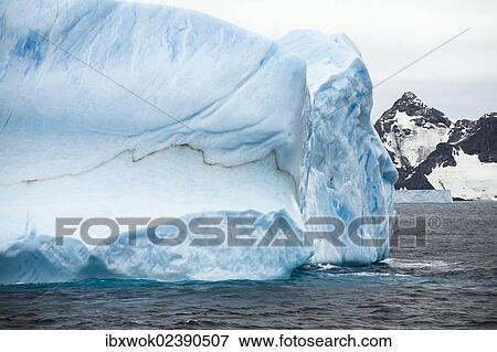 "Blue iceberg off Laurie Island, Washington Strait, South Orkneys, Southern Ocean, Antarctica" View Large Photo Image Stock Photo - "Blue iceberg off Laurie Island, Washington Strait, South Orkneys, Southern Ocean, Antarctica". Fotosearch