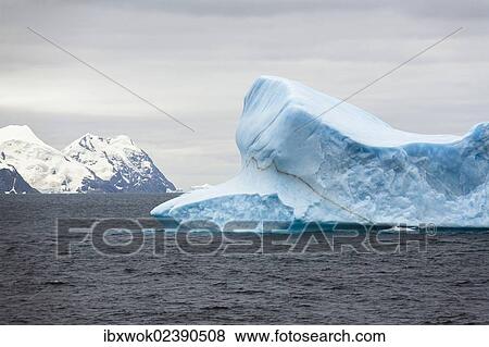 Stock Photo - "Blue iceberg off Laurie Island, Washington Strait, South Orkneys, Southern Ocean, Antarctica". Fotosearch