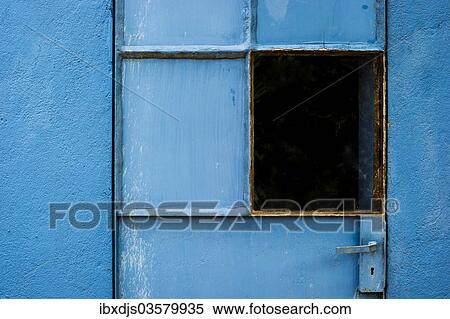 Stock Photography - "Blue-painted door with a window, Spain, Europe". Fotosearch