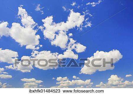 Blue sky with clouds View Large Photo Image Stock Image - Blue sky with clouds. Fotosearch