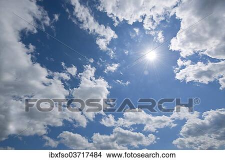 "Blue sky with sun and clouds, Thuringia, Germany, Europe" View Large Photo Image Picture - "Blue sky with sun and clouds, Thuringia, Germany, Europe". Fotosearch