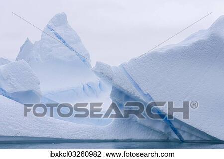 "Blue stripe, frozen melt water in a white iceberg, Pleneau Bay, Antarctic Peninsula, Antarctica" View Large Photo Image Stock Image - "Blue stripe, frozen melt water in a white iceberg, Pleneau Bay, Antarctic Peninsula, Antarctica". Fotosearch