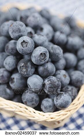 Blueberries in a basket View Large Photo Image Stock Photo - Blueberries in a basket. Fotosearch