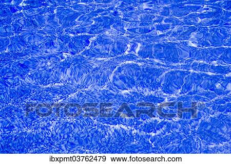 Blurry swimming pool water surface View Large Photo Image Stock Photo - Blurry swimming pool water surface. Fotosearch