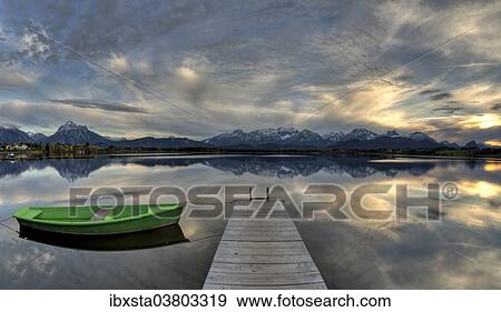 "Boat on a wharf on Hopfensee lake, near Fussen, East Allgau, Bavaria, Germany, Europe" View Large Photo Image Stock Photo - "Boat on a wharf on Hopfensee lake, near Fussen, East Allgau, Bavaria, Germany, Europe". Fotosearch