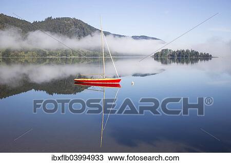 "Boat on the lake, morning mist, Schliersee Lake, Schliersee, Upper Bavaria, Bavaria, Germany, Europe" View Large Photo Image Stock Image - "Boat on the lake, morning mist, Schliersee Lake, Schliersee, Upper Bavaria, Bavaria, Germany, Europe". Fotosearch