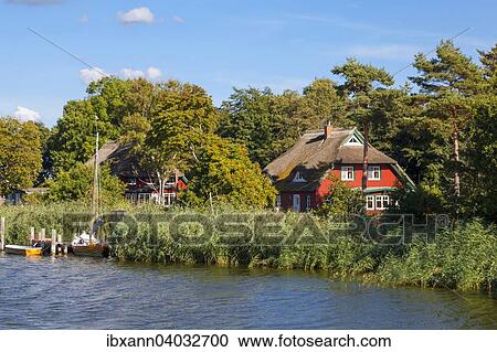 "Boats and houses on Prerower Strom or Prerowstrom, arm of the Baltic Sea, Fischland-Darss-Zingst, Western Pomerania Lagoon Area National Park, near Prerow, Mecklenburg-Western Pomerania, Germany, Europe" View Large Photo Image Stock Image - "Boats and houses on Prerower Strom or Prerowstrom, arm of the Baltic Sea, Fischland-Darss-Zingst, Western Pomerania Lagoon Area National Park, near Prerow, Mecklenburg-Western Pomerania, Germany, Europe". Fotosearch