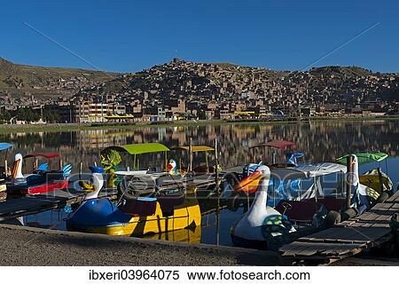 "Boats in the harbour of Puno on Lake Titicaca, Puno, Peru, South America" View Large Photo Image Stock Photography - "Boats in the harbour of Puno on Lake Titicaca, Puno, Peru, South America". Fotosearch