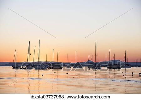"Boats on Lake Constance, evening mood, Lake Constance, Allensbach, Baden-Wurttemberg, Germany, Europe" View Large Photo Image Stock Photo - "Boats on Lake Constance, evening mood, Lake Constance, Allensbach, Baden-Wurttemberg, Germany, Europe". Fotosearch