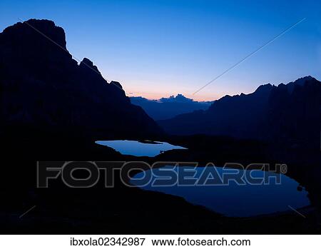 "Boedenseen lakes at dawn, Dolomiti di Sesto National Park, Sexten Dolomites, Dolomites, province of Bolzano-Bozen, Italy, Europe" View Large Photo Image Stock Photo - "Boedenseen lakes at dawn, Dolomiti di Sesto National Park, Sexten Dolomites, Dolomites, province of Bolzano-Bozen, Italy, Europe". Fotosearch